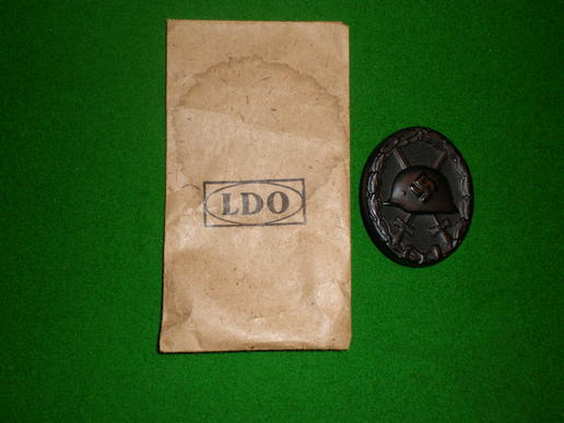 Black Wound badge and LDO packet.