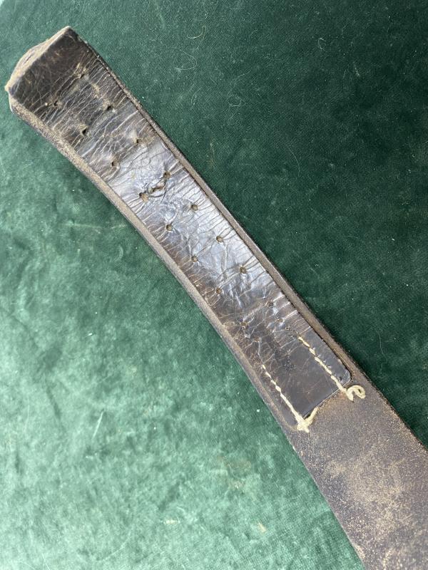 A 1938 THIRD REICH DATED BROWN BELT LEATHER (LUFTWAFFE?) MARKED.