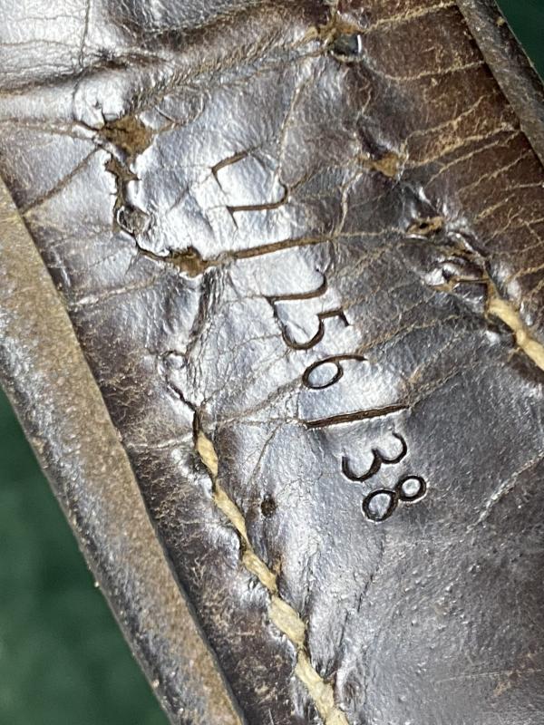 A 1938 THIRD REICH DATED BROWN BELT LEATHER (LUFTWAFFE?) MARKED.
