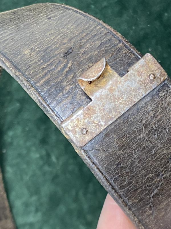 A 1938 THIRD REICH DATED BROWN BELT LEATHER (LUFTWAFFE?) MARKED.