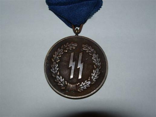 RARE ORIGINAL SS 4 YEAR SERVICE MEDAL WITH RIBBON.