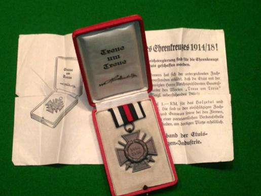 Cased Cross of Honour in bronze with swords.