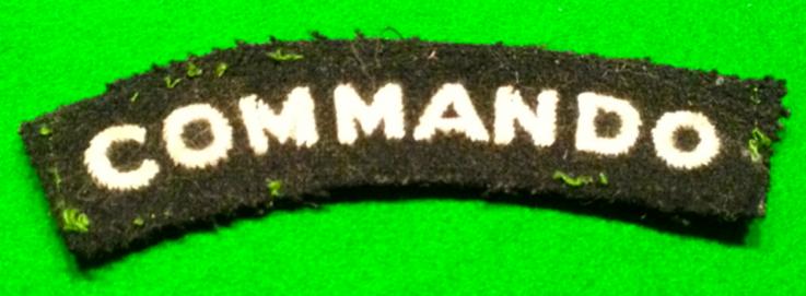 ' Commando ' shoulder title.