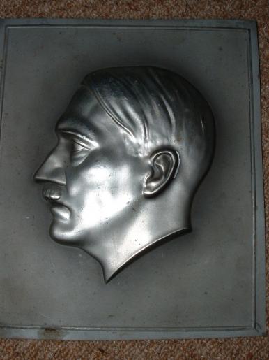 HITLER HEAD SILHOUETTE PICTURESTAMPED IN ZINC.