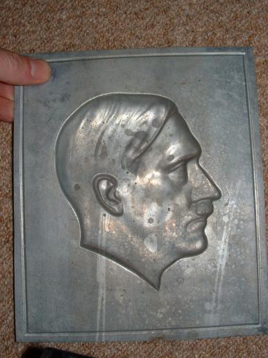 HITLER HEAD SILHOUETTE PICTURESTAMPED IN ZINC.