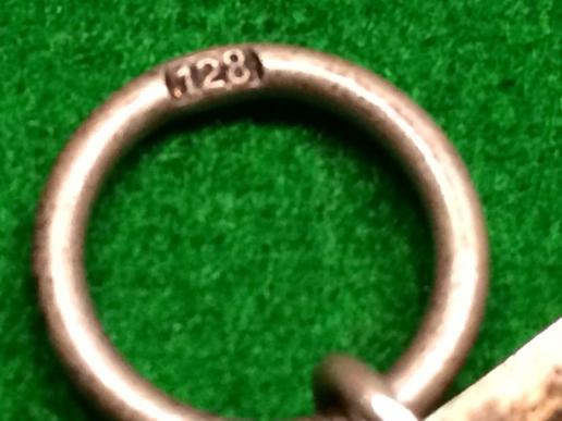 EK II ringmarked ' 128 '.