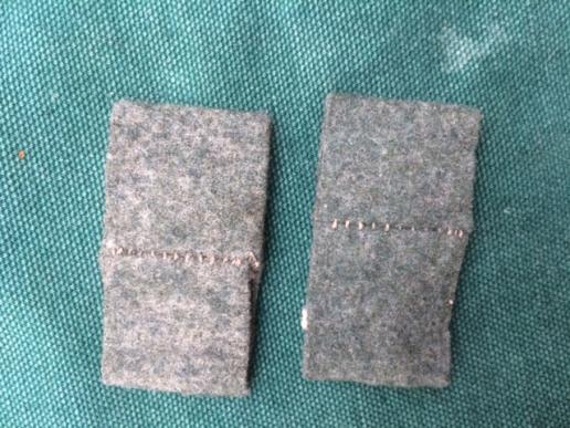 PAIR OF THIRD REICH SLIP ON REGIMENTAL NUMBERS.